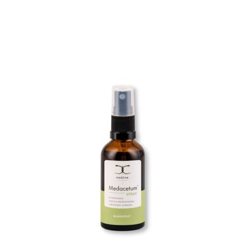 Eine kompakte Sprühflasche Medacetum Mundpflege Spray auf einem hellen, sauberen Untergrund.